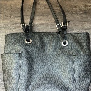 Michael Khor’s wallet & purse.